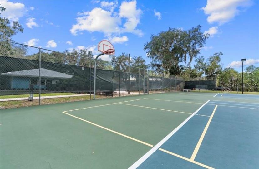 18970 Southwest 99th Street Dunnellon, FL 34432 - Photo 51 of 52 a view of a tennis court