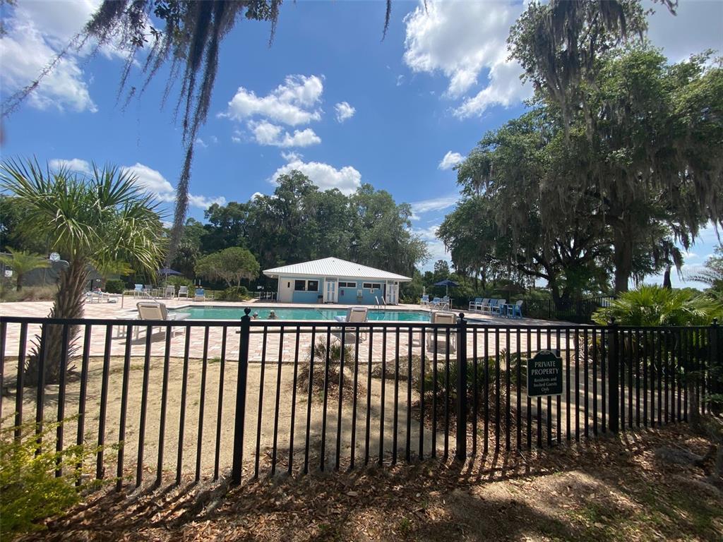 18970 Southwest 99th Street Dunnellon, FL 34432 - Photo 52 of 52 a view of a wooden roof deck