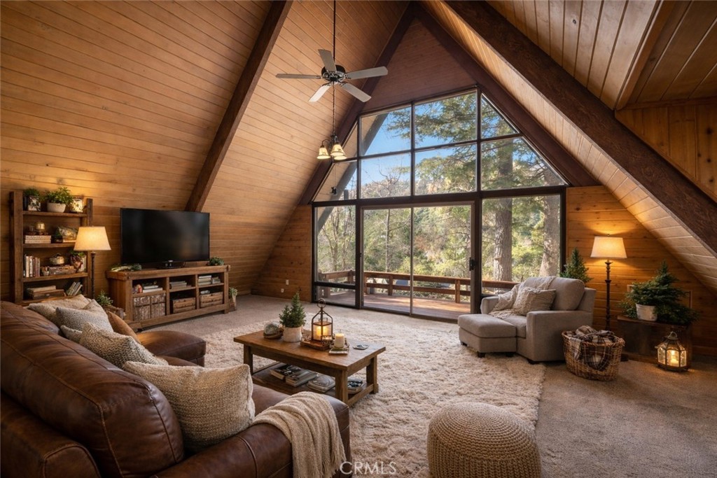 6069 Maple Avenue Angelus Oaks, CA 92305 - Photo 13 of 51 a living room with furniture and a large window