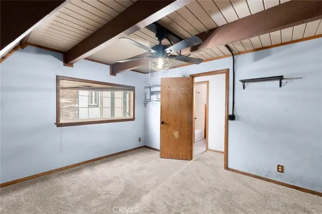 a bathroom with a sink toilet and mirror