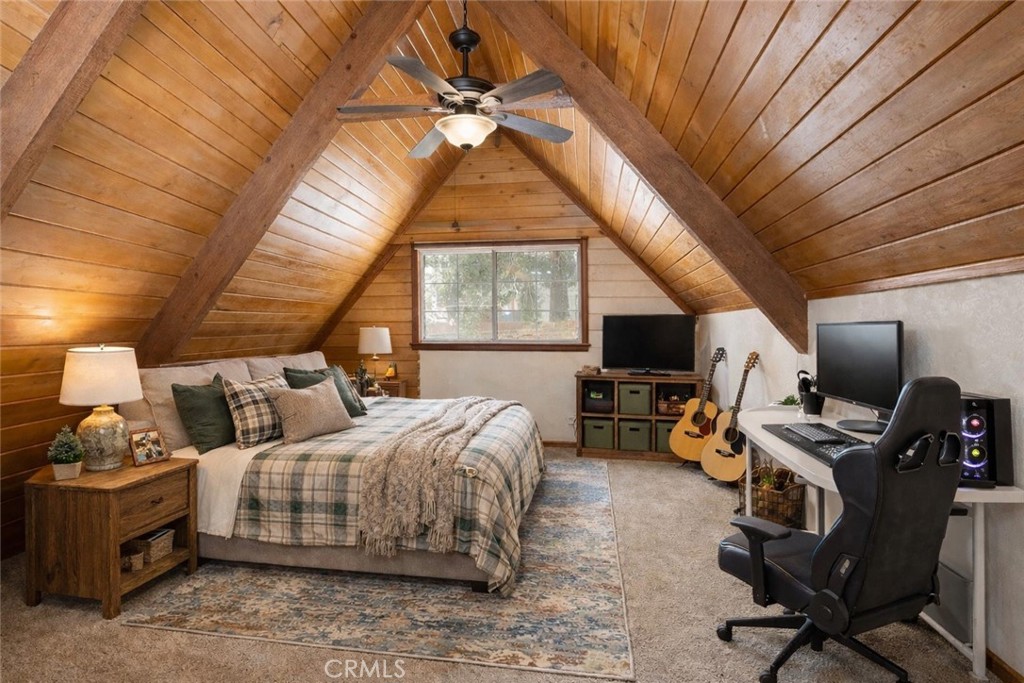 6069 Maple Avenue Angelus Oaks, CA 92305 - Photo 32 of 51 a bedroom with bed a computer on the desk and chair