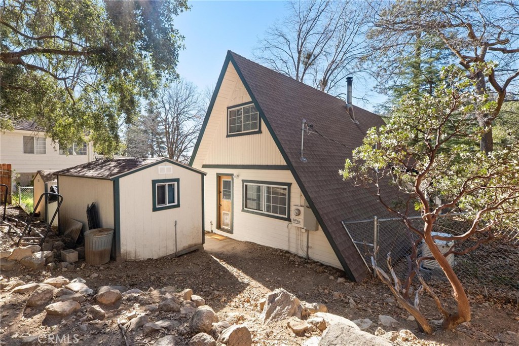 6069 Maple Avenue Angelus Oaks, CA 92305 - Photo 39 of 51 a view of a house with a yard