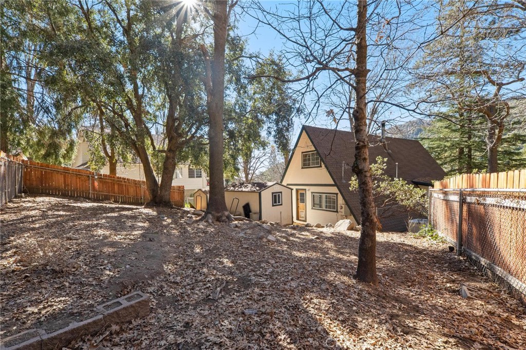 6069 Maple Avenue Angelus Oaks, CA 92305 - Photo 42 of 51 a view of a house with a yard tree front of house