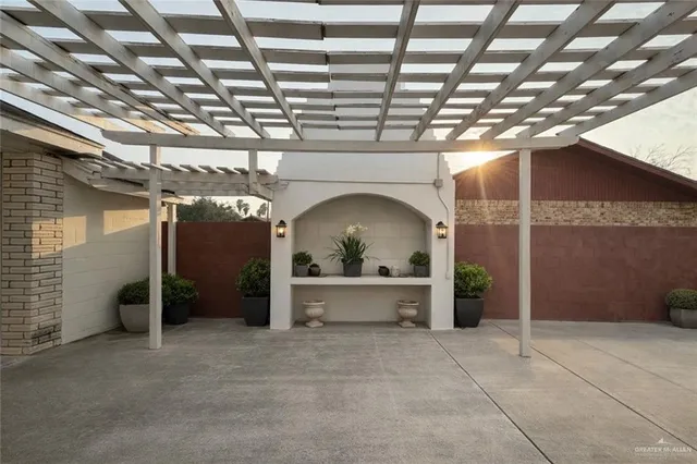 a view of an empty room with a fireplace