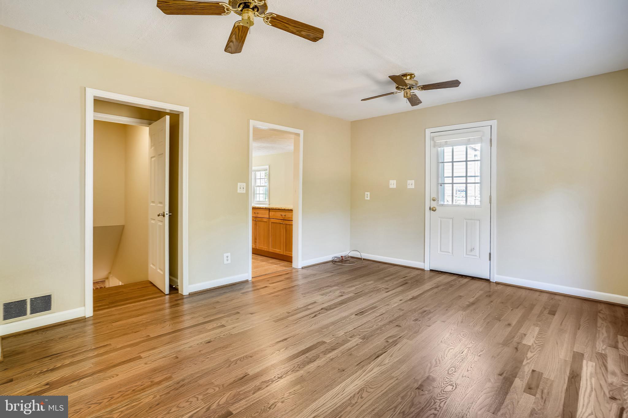 4029 Walters Court Fairfax, VA 22030 - Photo 11 of 29 Family Room w/ Hardwood Flooring and Ceiling Fans