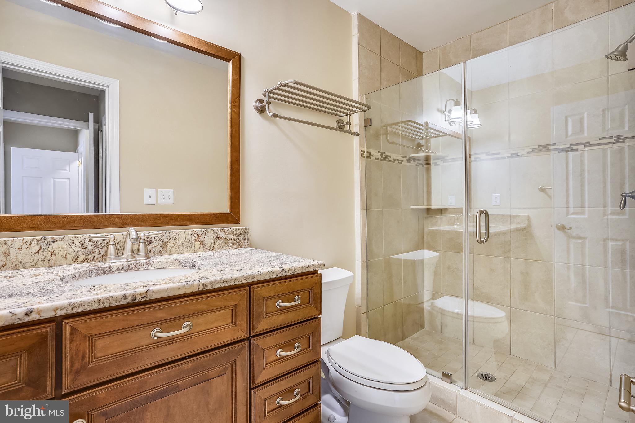 4029 Walters Court Fairfax, VA 22030 - Photo 14 of 29 Updated Primary Bathroom with Custom Shower