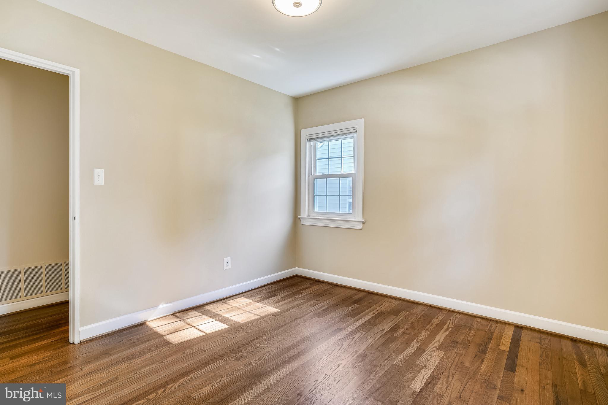 4029 Walters Court Fairfax, VA 22030 - Photo 18 of 29 Third Bedroom with Hardwood Flooring