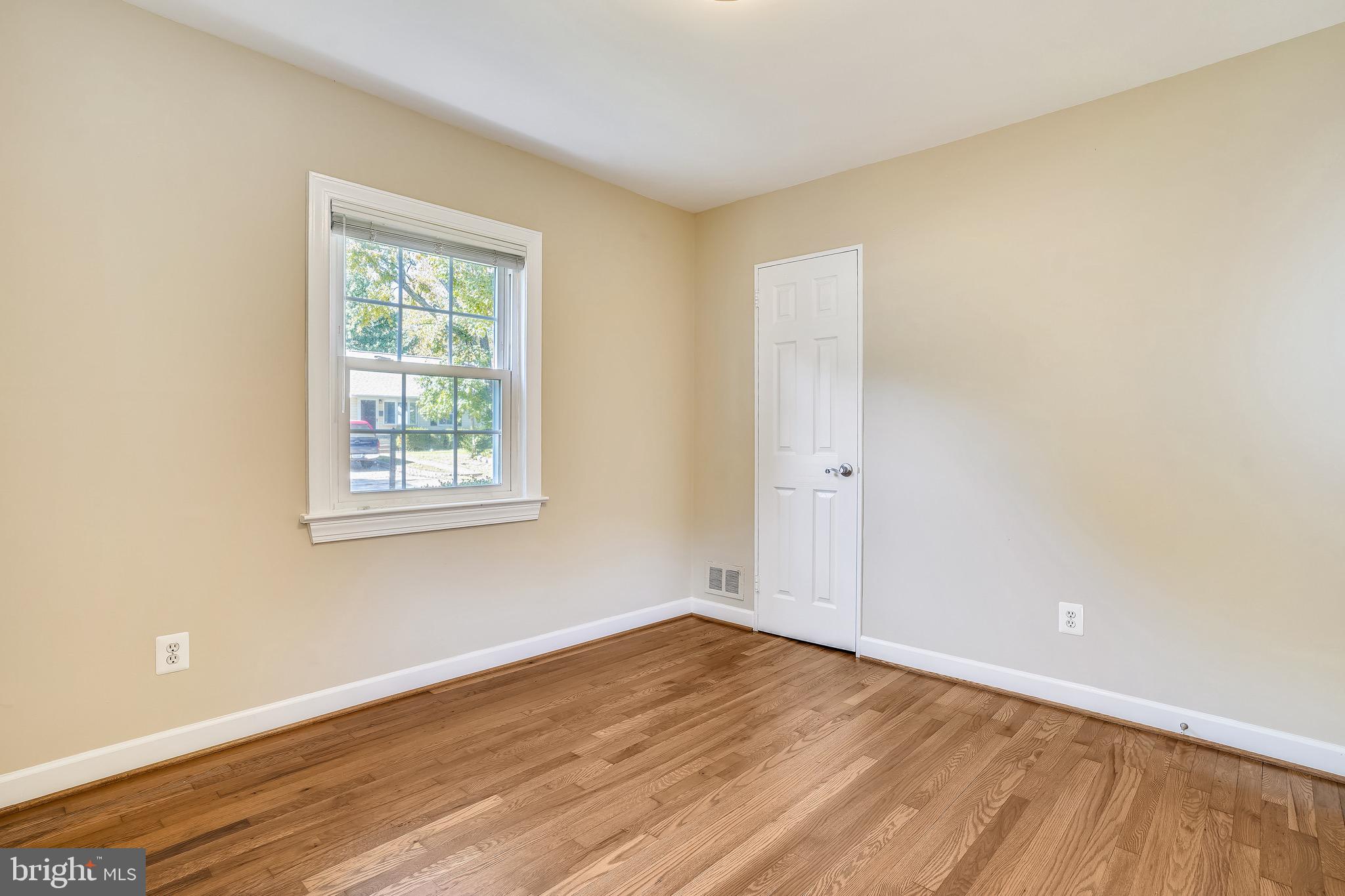 4029 Walters Court Fairfax, VA 22030 - Photo 19 of 29 Third Bedroom with Hardwood Flooring