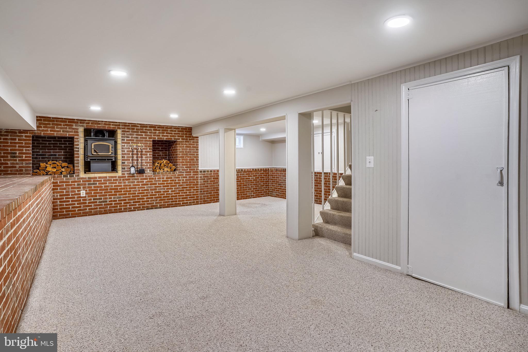 4029 Walters Court Fairfax, VA 22030 - Photo 21 of 29 Recreation Room with Fireplace
