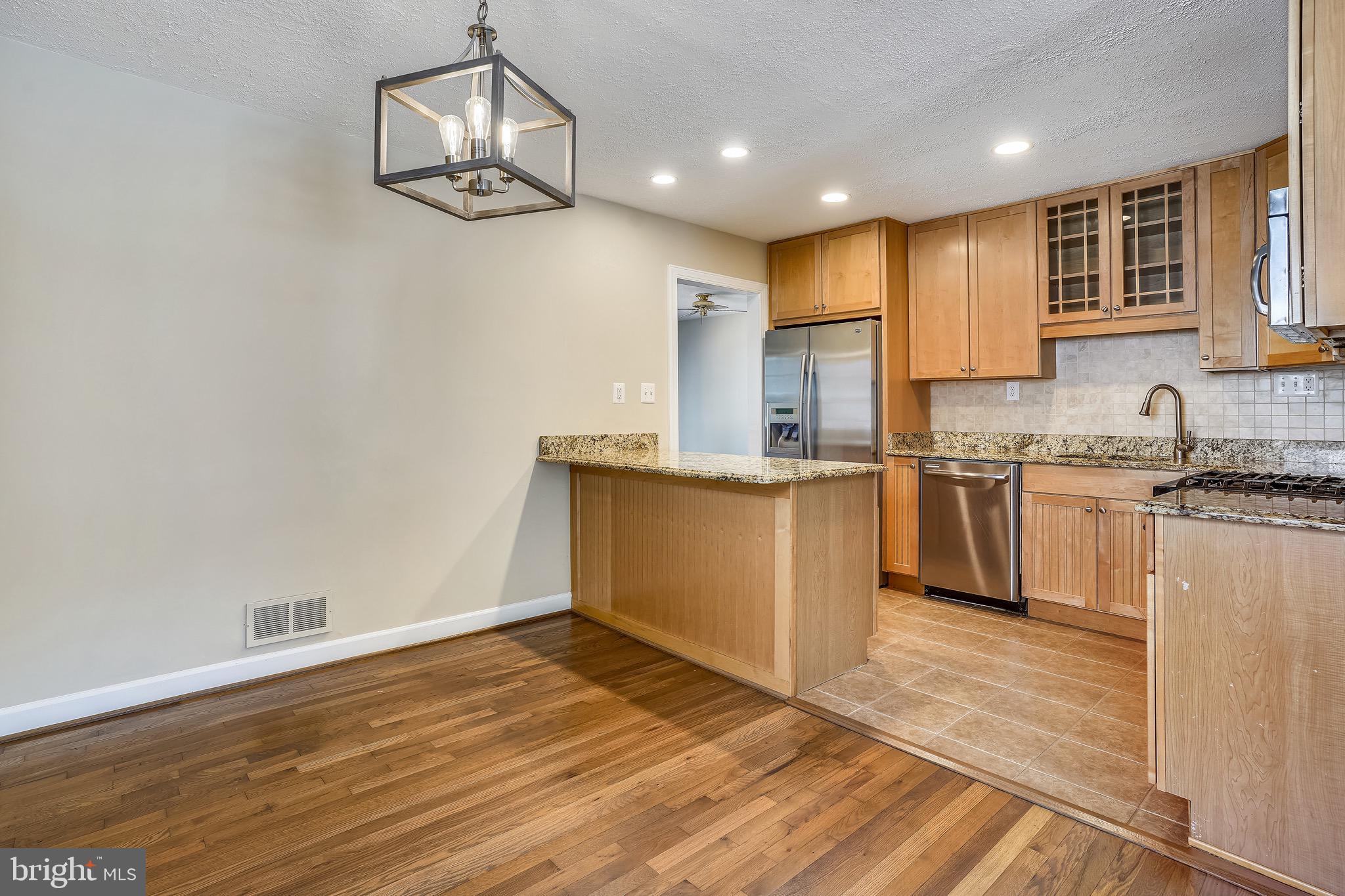 4029 Walters Court Fairfax, VA 22030 - Photo 7 of 29 Dining Area with Hardwood Flooring