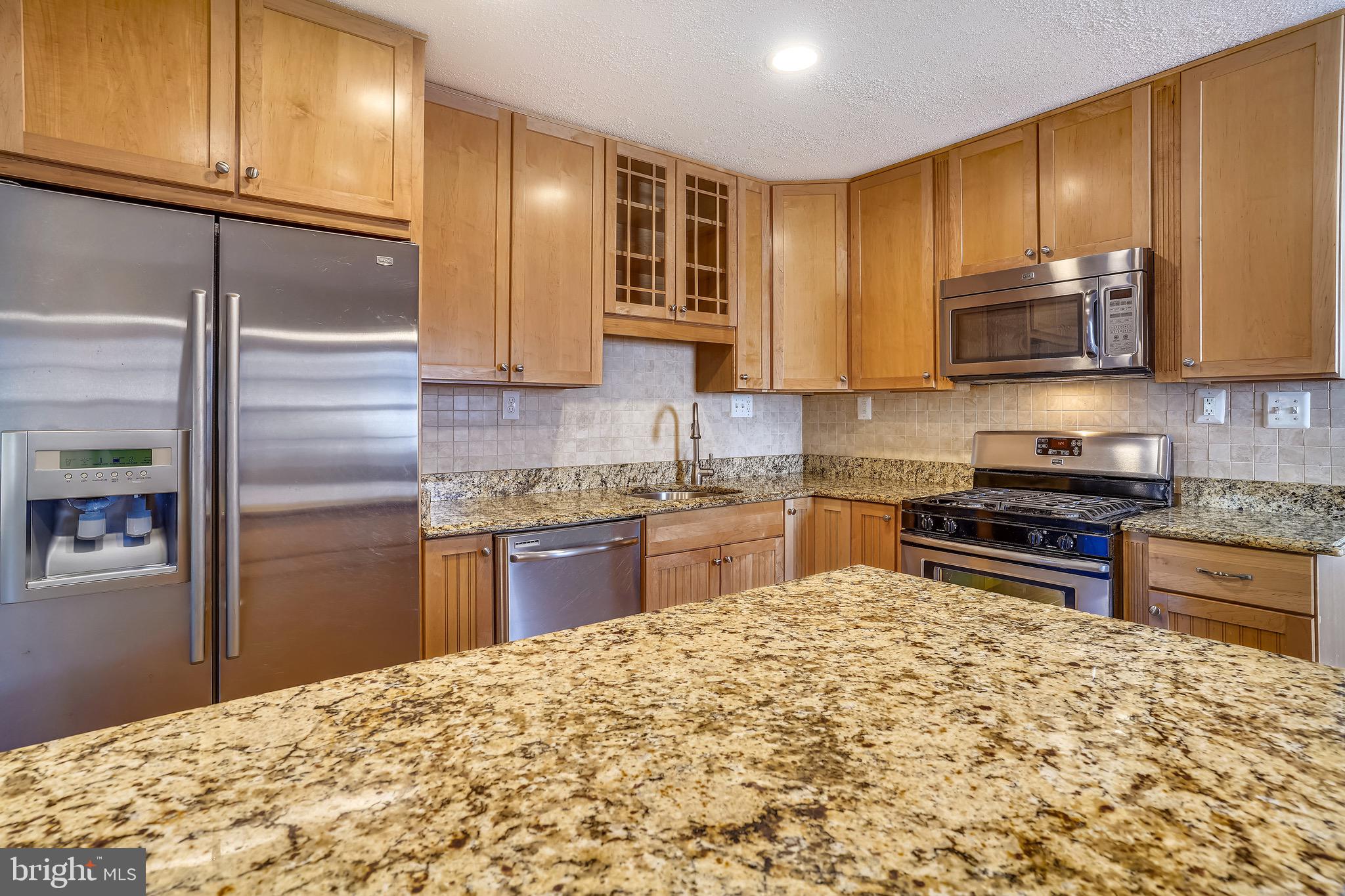 4029 Walters Court Fairfax, VA 22030 - Photo 9 of 29 Gourmet Kitchen w/ Granite Counters and SS Appl.