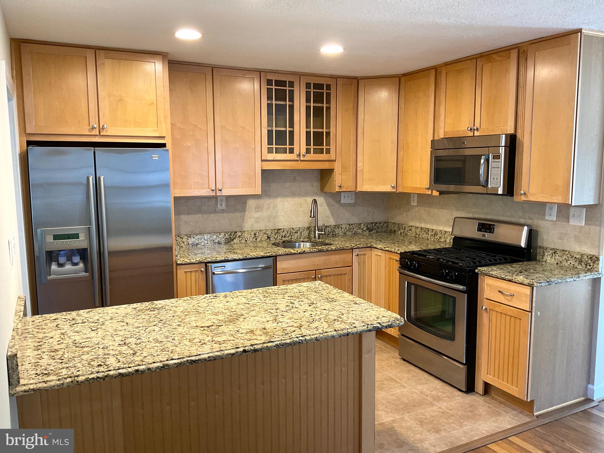 4029 Walters Court Fairfax, VA 22030 - Photo 10 of 29 Gourmet Kitchen w/ Breakfast Bar