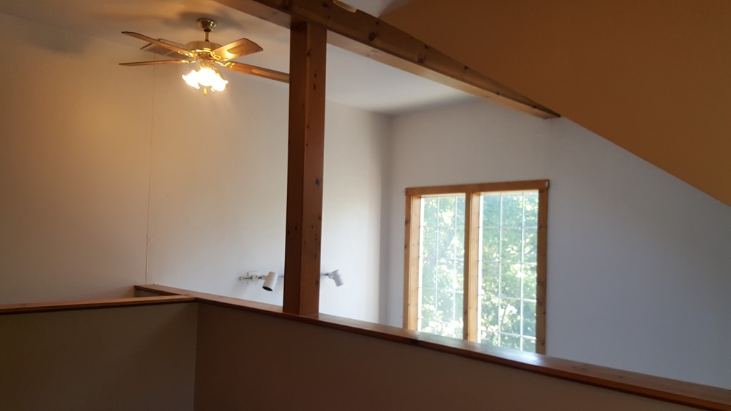 191 City Depot Road, Unit B Charlton, MA 01507 - Photo 11 of 12 a view of a livingroom with a ceiling fan and window