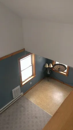 a view of a livingroom with a window