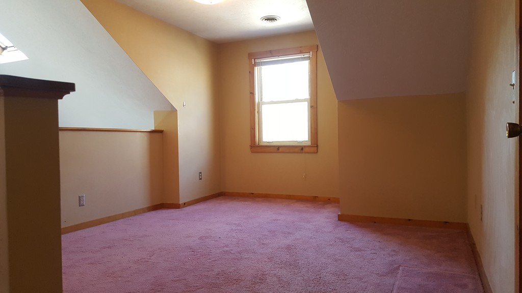 191 City Depot Road, Unit B Charlton, MA 01507 - Photo 10 of 12 an empty room with windows
