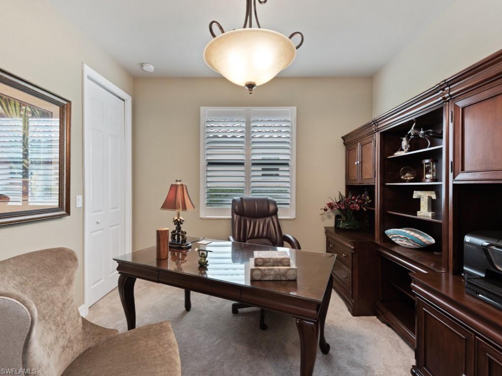 9507 Piacere Way Naples, FL 34113 - Photo 16 of 32 a dining room with furniture and window