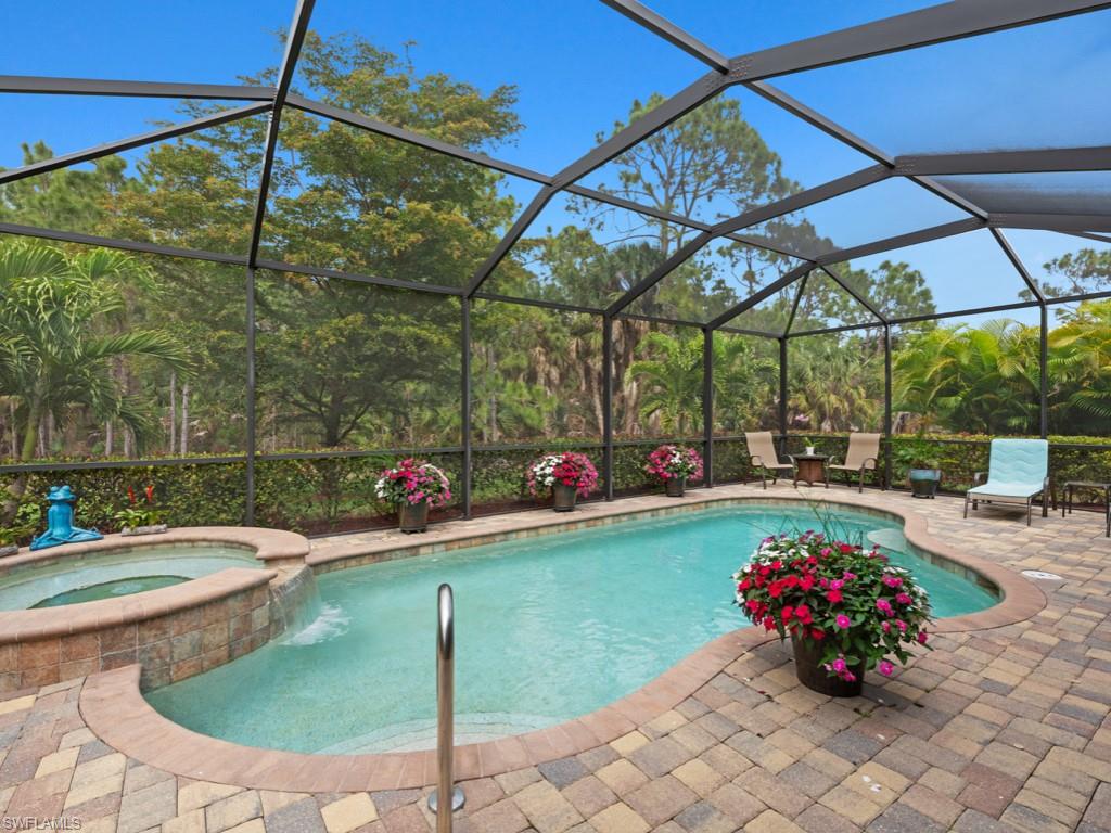 9507 Piacere Way Naples, FL 34113 - Photo 21 of 32 a view of outdoor space patio and swimming pool