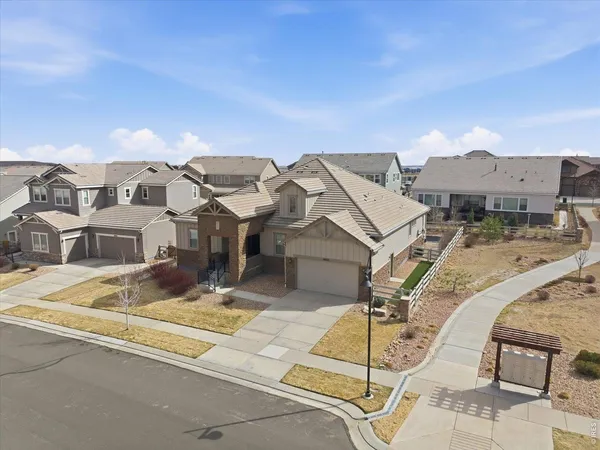 a front view of a house with garage