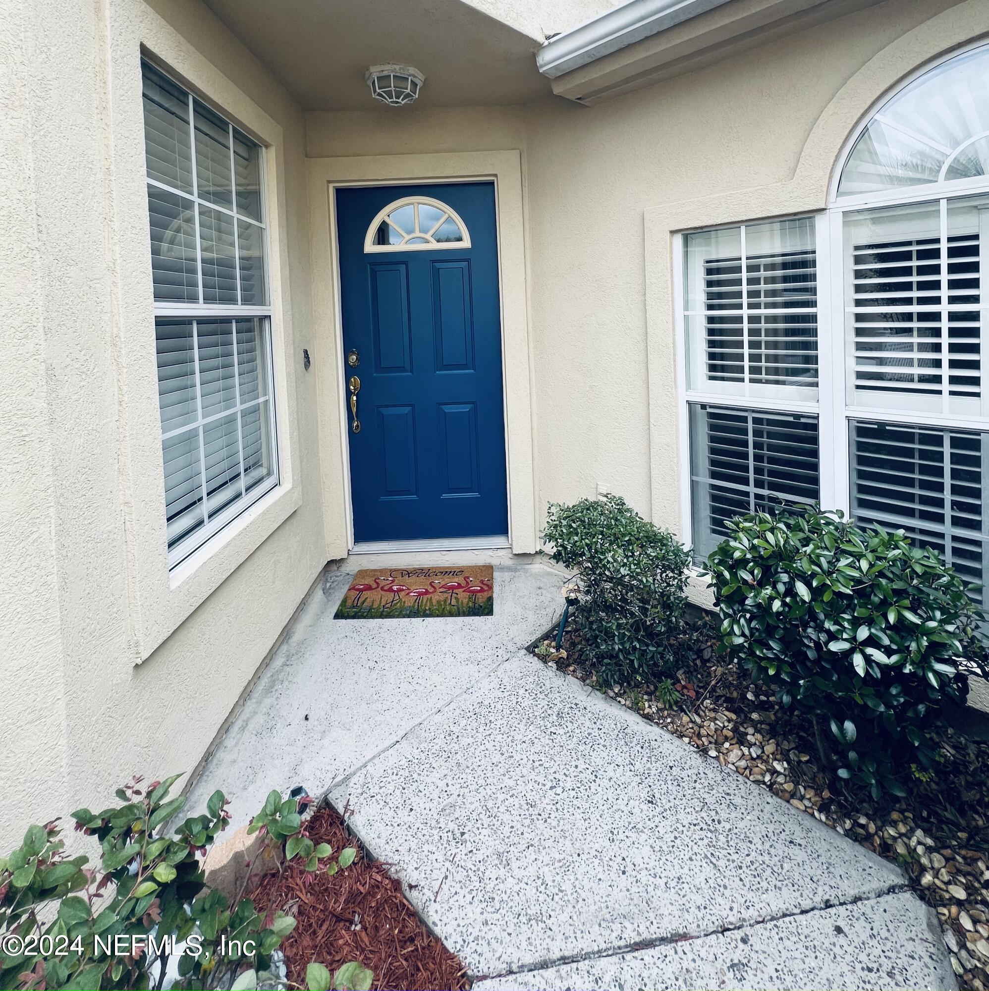 91 Fox Valley Drive Orange Park, FL 32073 - Photo 1 of 28 a view of front door of house