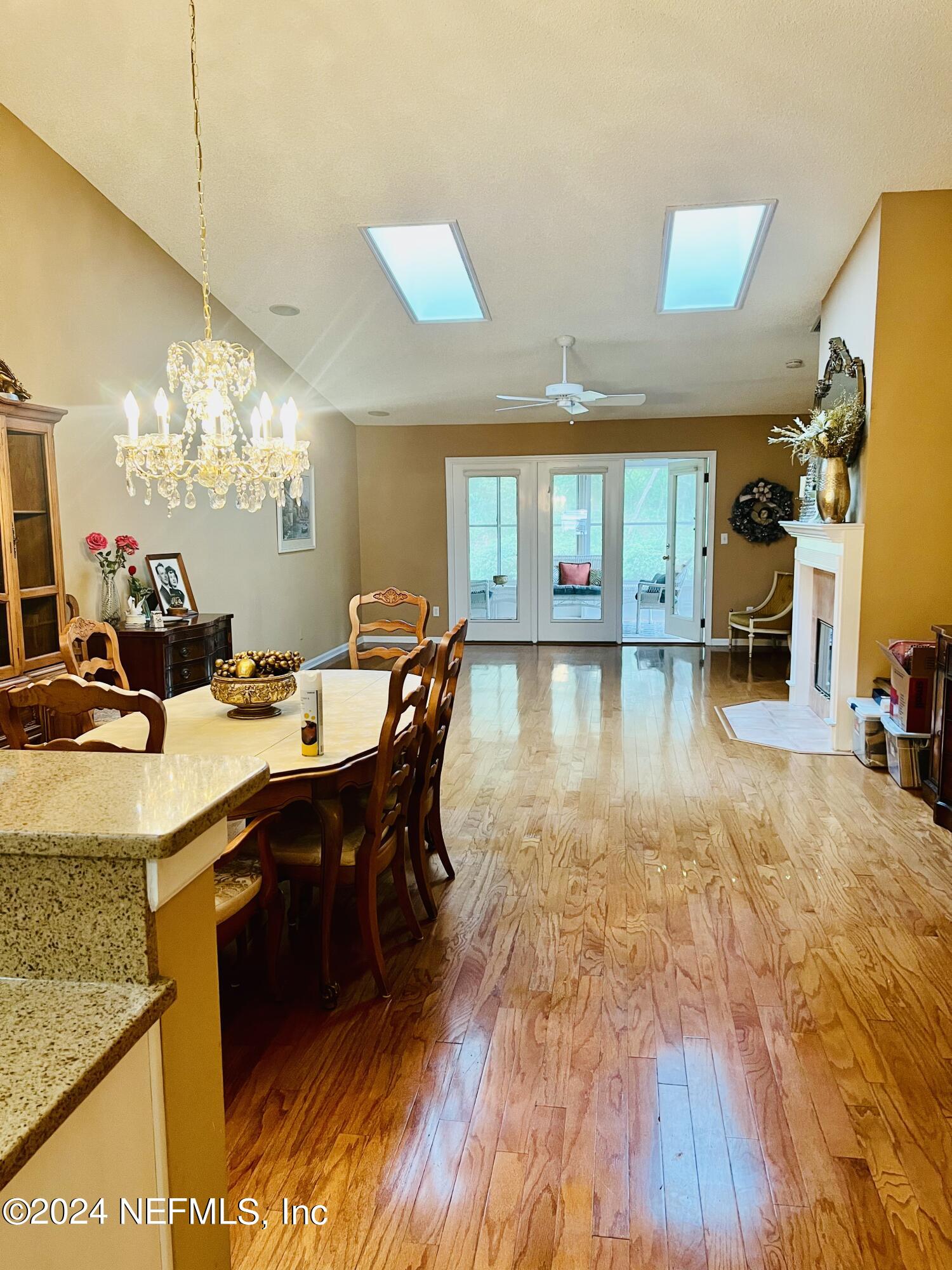 91 Fox Valley Drive Orange Park, FL 32073 - Photo 12 of 28 a large hall with dining table and chairs
