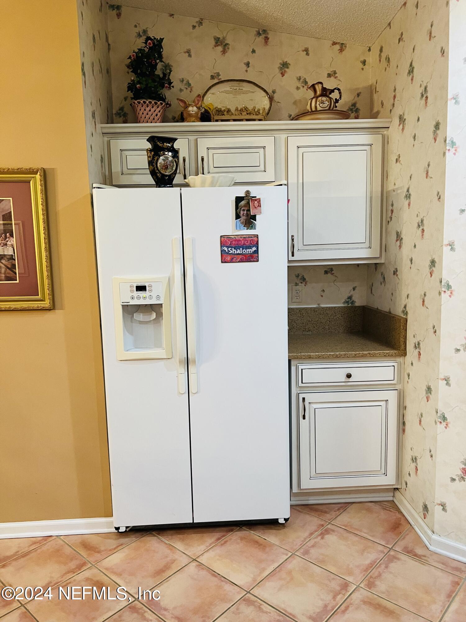 91 Fox Valley Drive Orange Park, FL 32073 - Photo 16 of 28 a utility room with dryer and washer