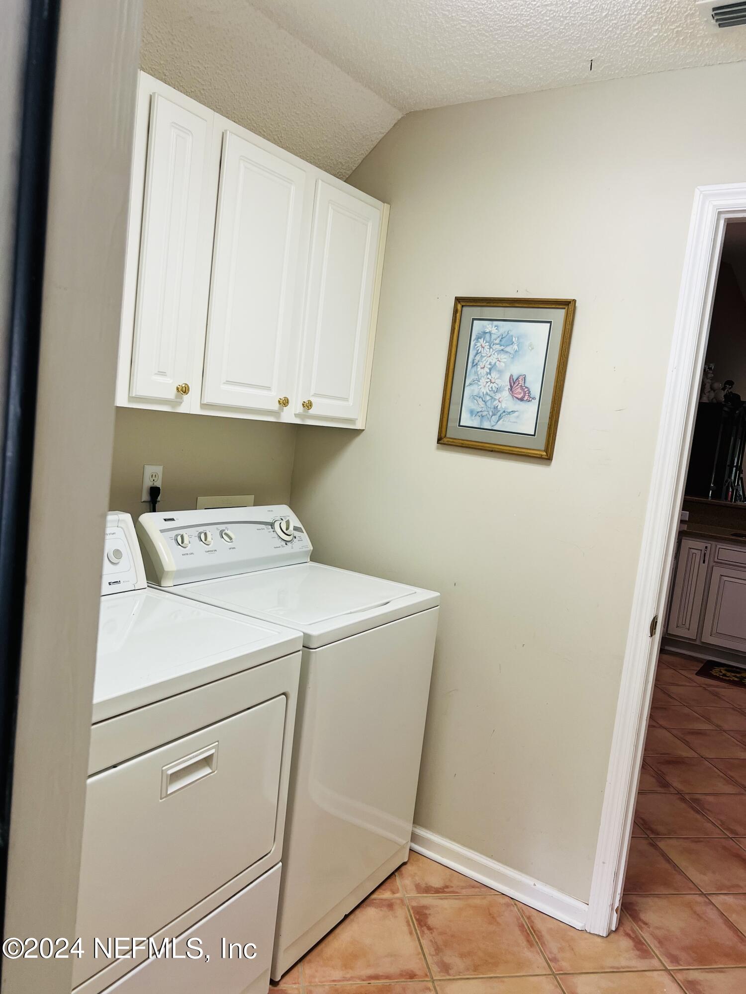 91 Fox Valley Drive Orange Park, FL 32073 - Photo 18 of 28 a utility room with dryer and washer