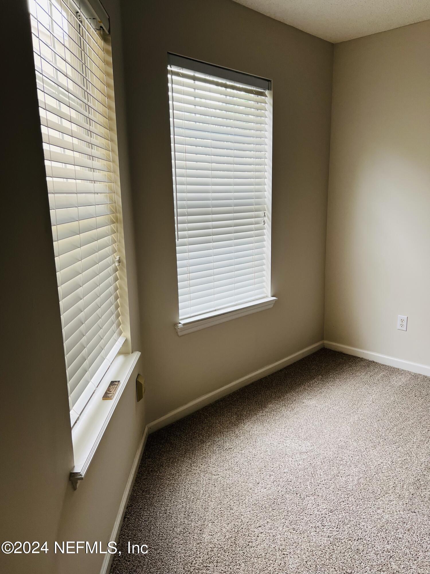 91 Fox Valley Drive Orange Park, FL 32073 - Photo 24 of 28 a view of an empty room with a window
