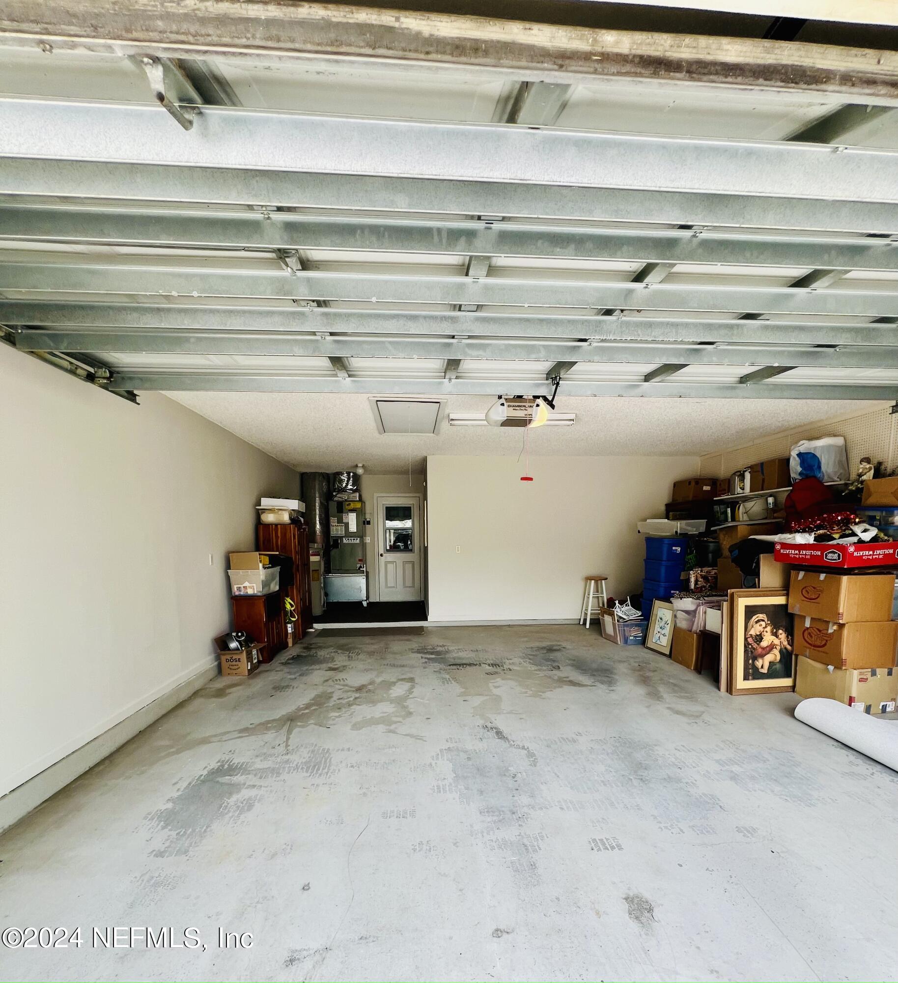 91 Fox Valley Drive Orange Park, FL 32073 - Photo 28 of 28 a view of a garage with storage