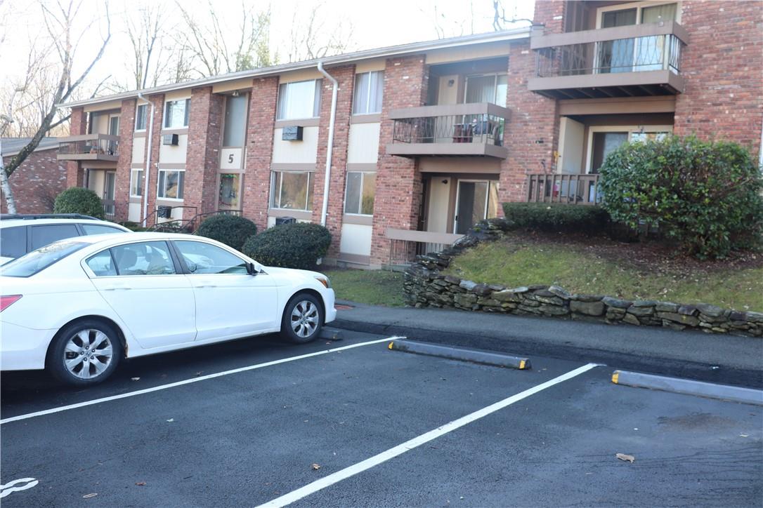 5 Rolling Way, Unit D Peekskill, NY 10566 - Photo 1 of 1 a front view of a house with parking space