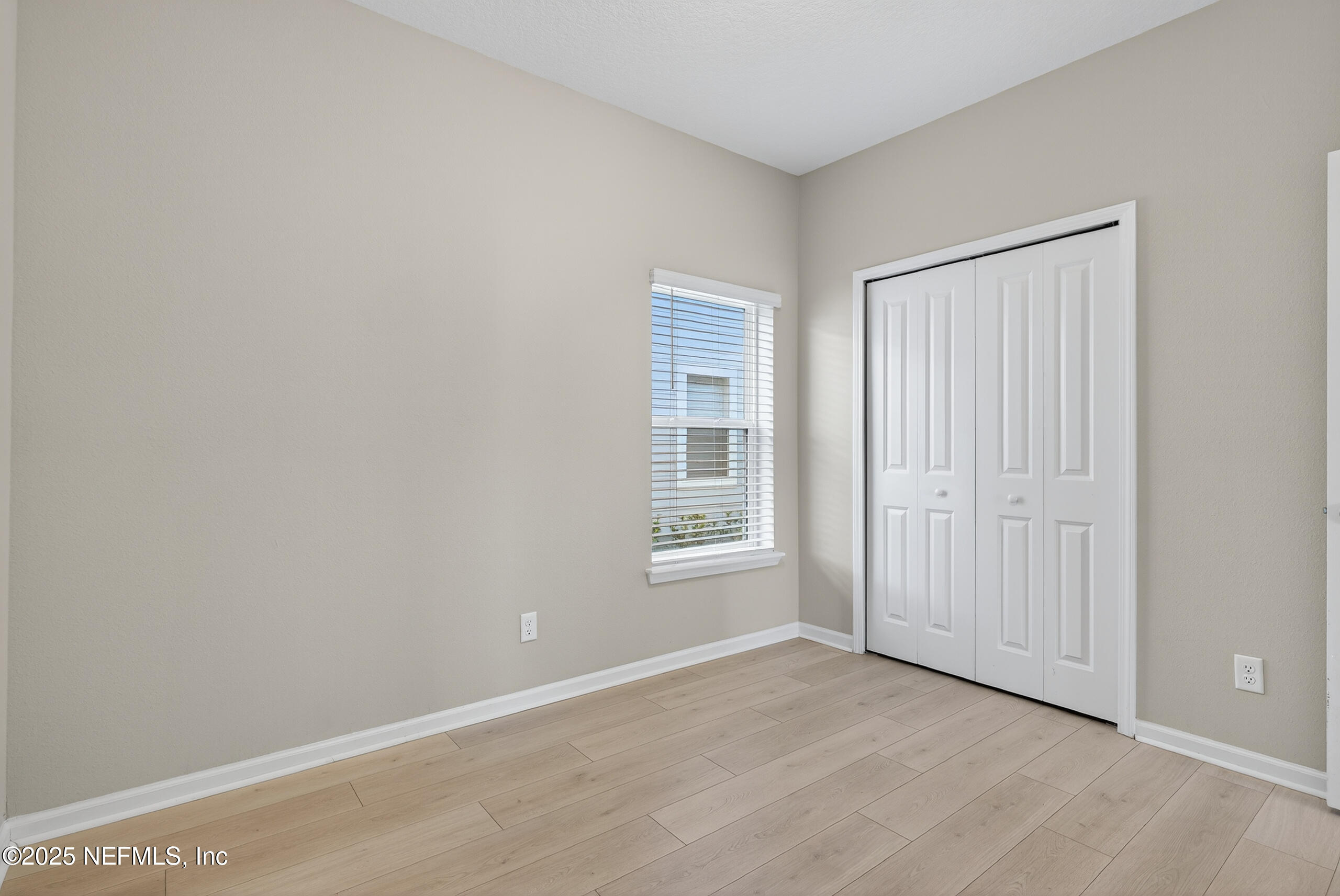 75598 Blackbird Drive Yulee, FL 32097 - Photo 22 of 30 a view of an empty room with window