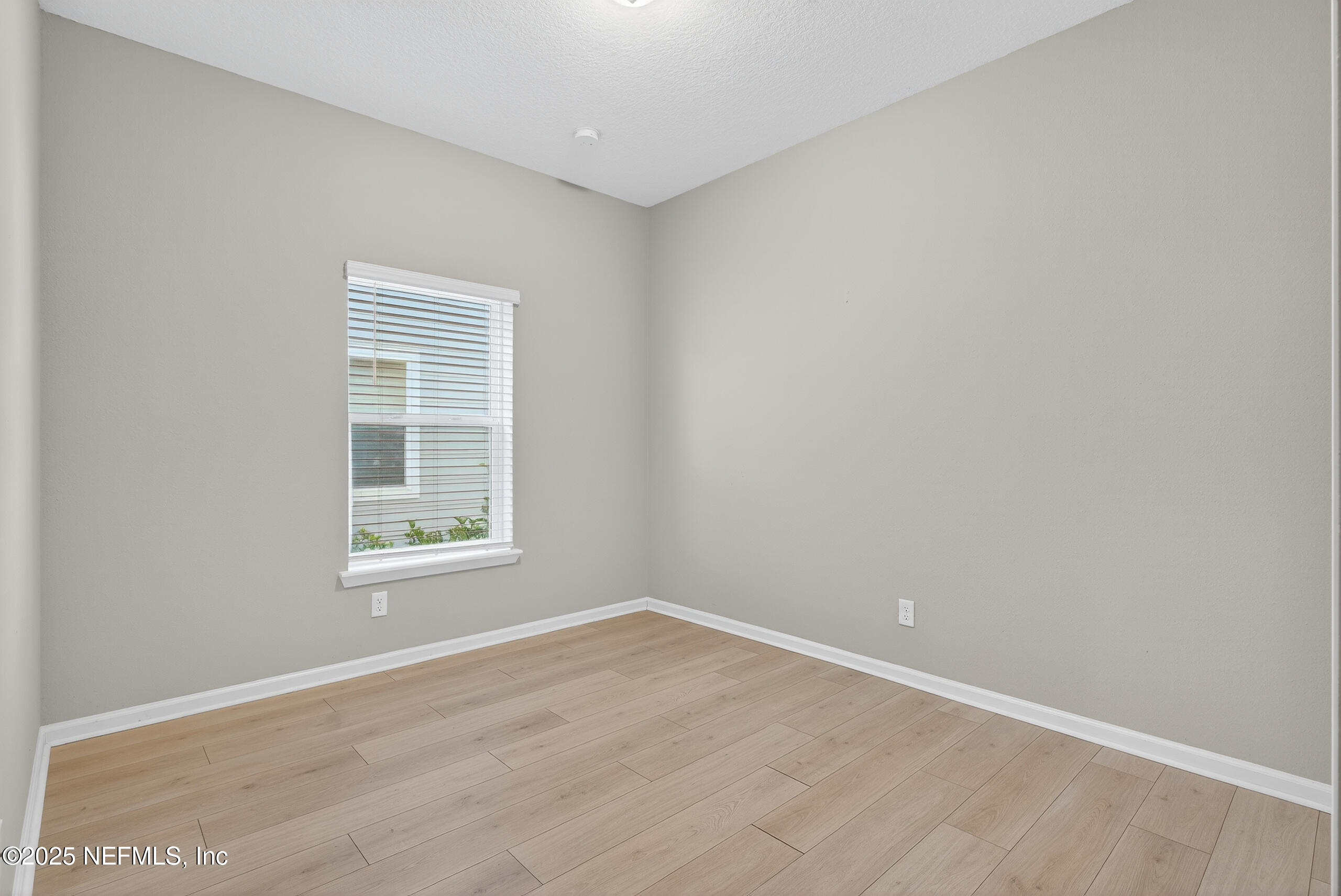 75598 Blackbird Drive Yulee, FL 32097 - Photo 23 of 30 an empty room with a window