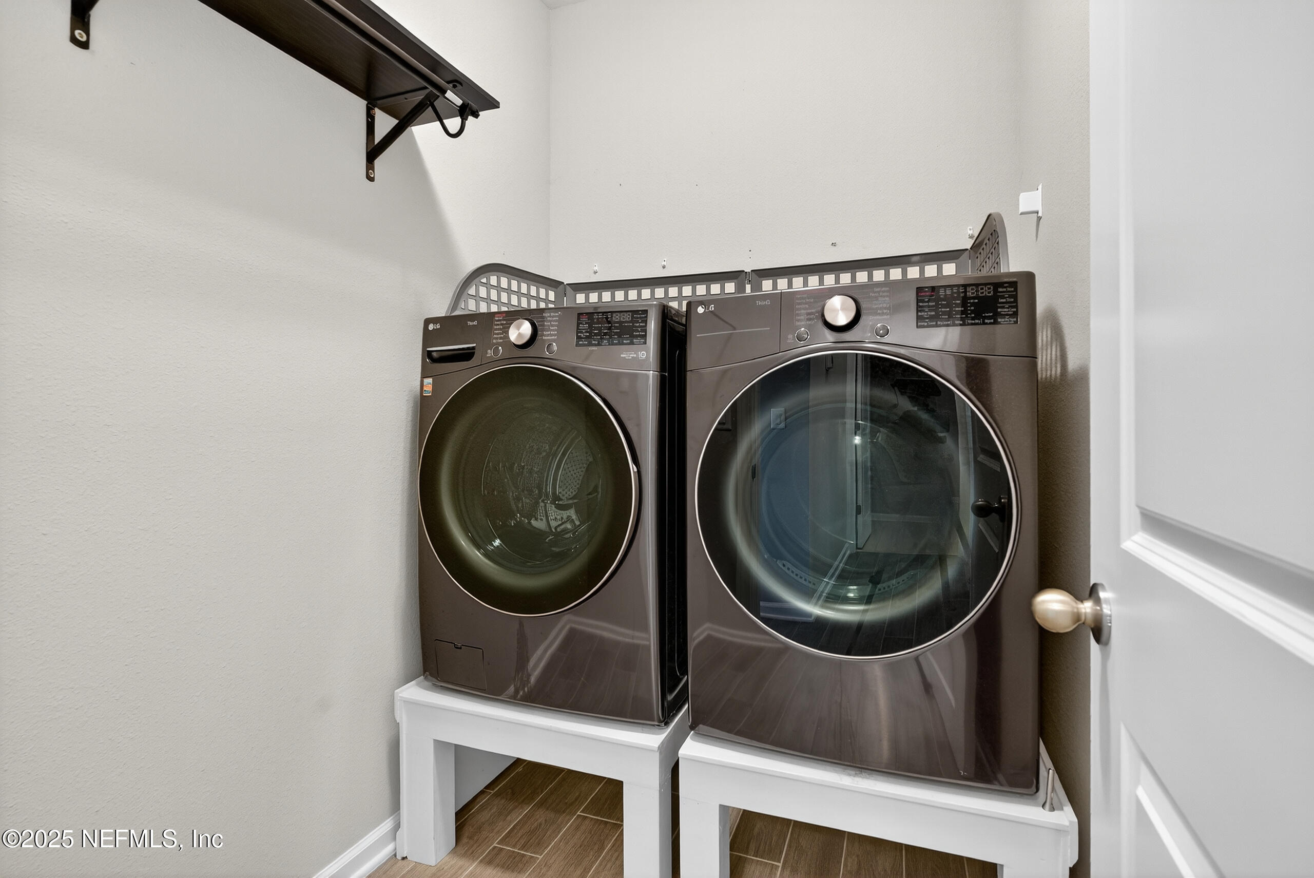 75598 Blackbird Drive Yulee, FL 32097 - Photo 26 of 30 a utility room with dryer and washer