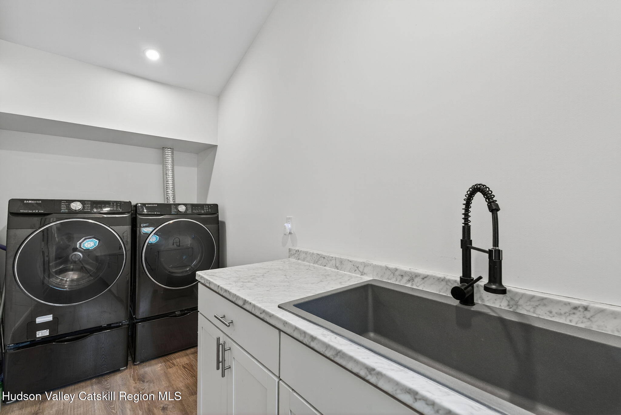 40 Paddock Road East Durham, NY 12423 - Photo 14 of 61 a utility room with sink dryer and washer