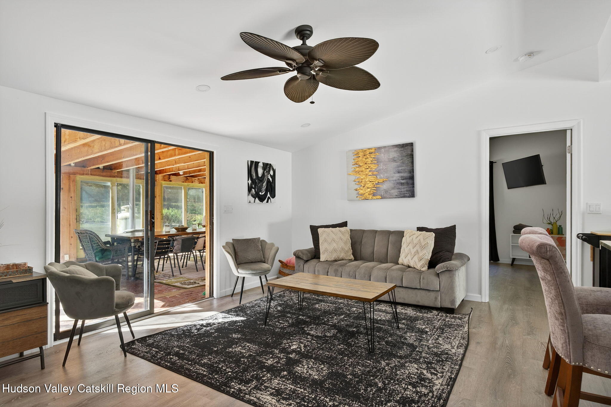 40 Paddock Road East Durham, NY 12423 - Photo 3 of 61 a living room with furniture and a rug