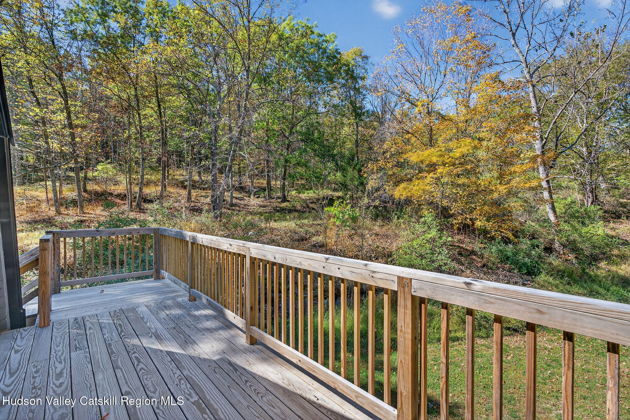 40 Paddock Road East Durham, NY 12423 - Photo 41 of 61 a view of a balcony with wooden floor