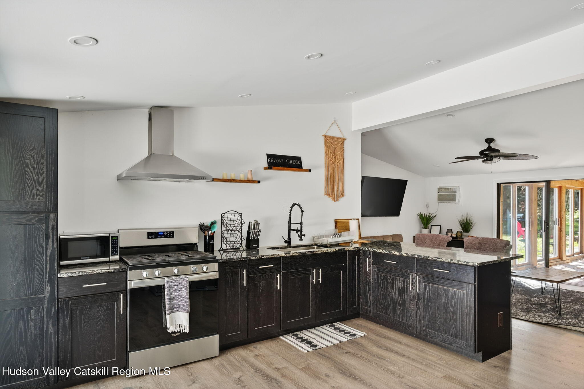40 Paddock Road East Durham, NY 12423 - Photo 5 of 61 a kitchen with a sink and stove
