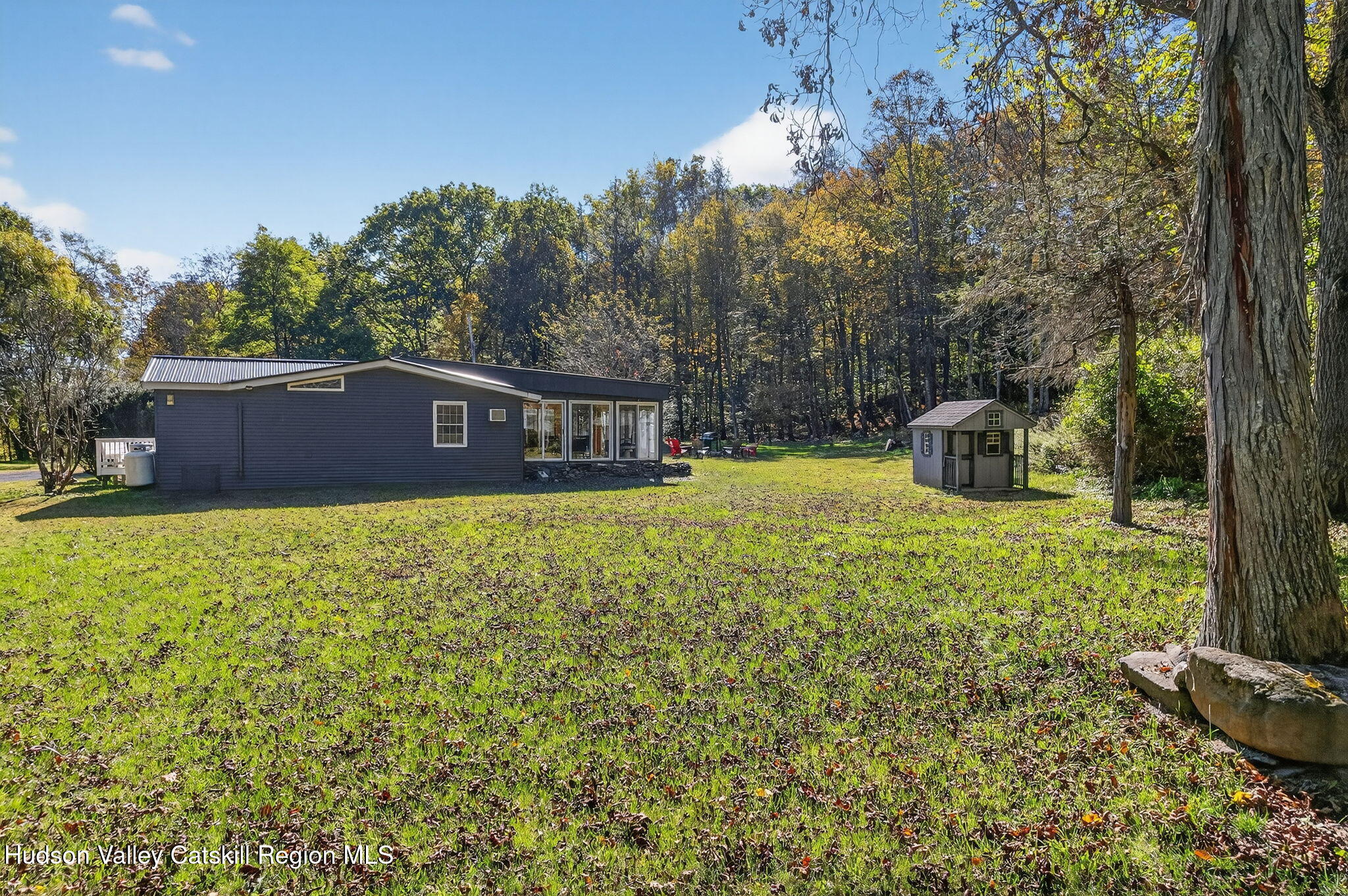 40 Paddock Road East Durham, NY 12423 - Photo 53 of 61 a view of a house with a yard
