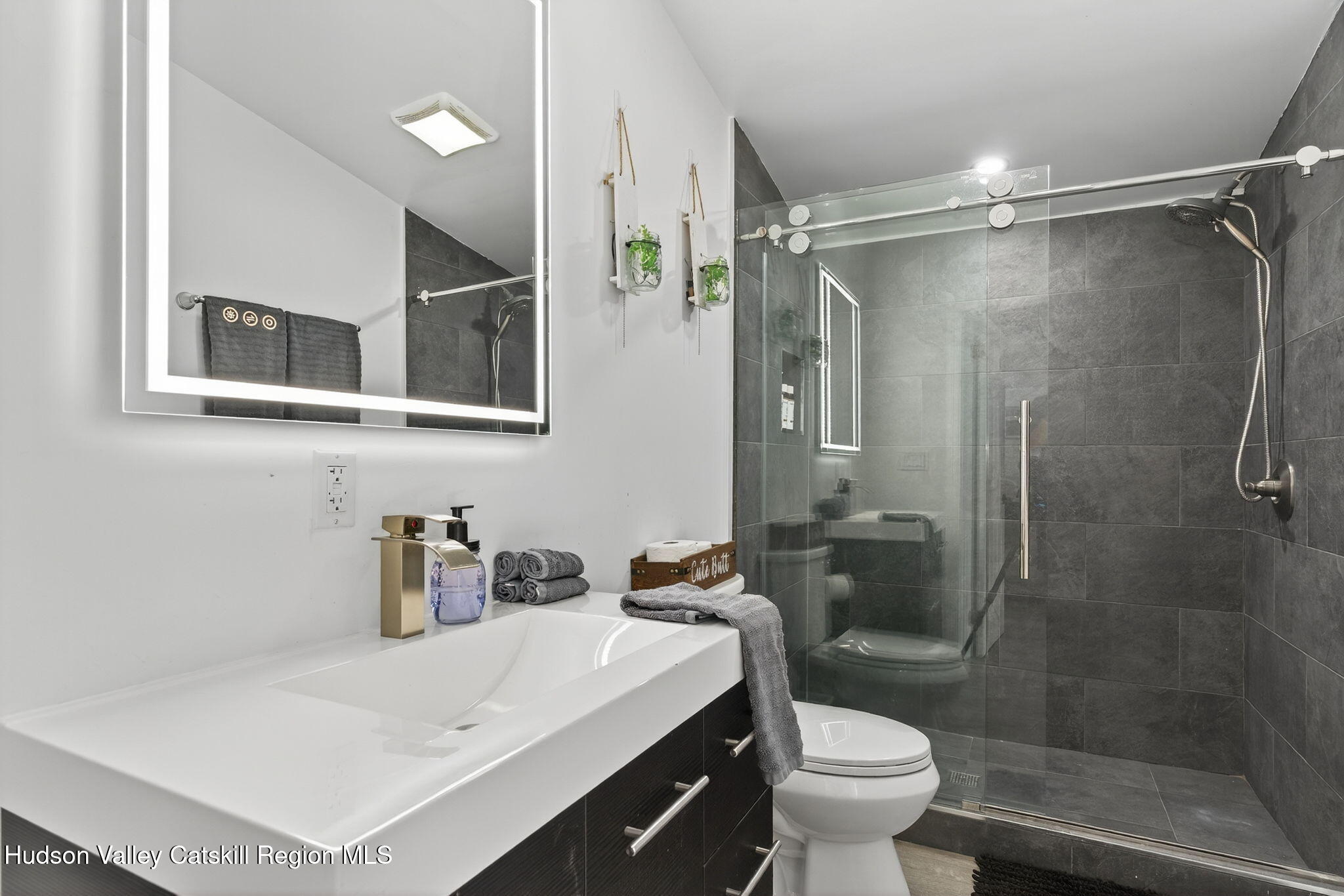 40 Paddock Road East Durham, NY 12423 - Photo 7 of 61 a bathroom with a sink toilet and shower