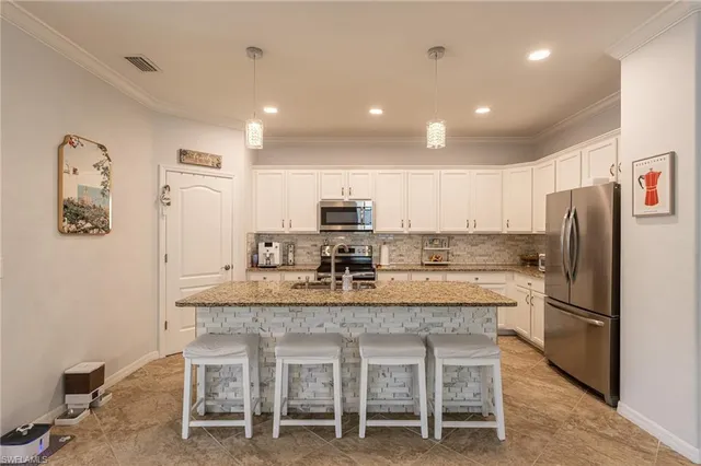 $699,000 | 9231 Shadow Oak Lane, Naples, FL 34120