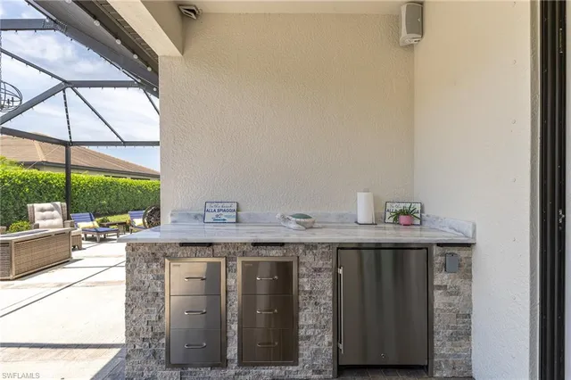 $699,000 | 9231 Shadow Oak Lane, Naples, FL 34120