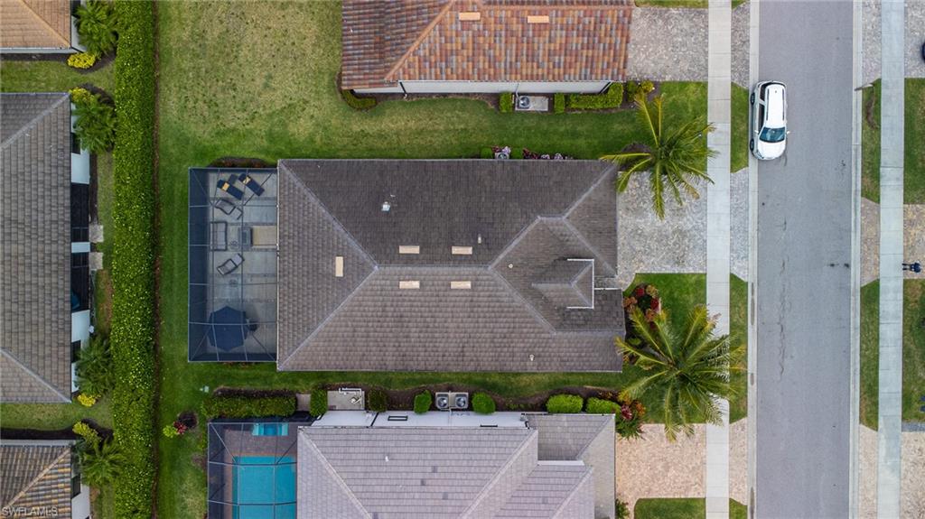 9231 Shadow Oak Lane Naples, FL 34120 - Photo 43 of 46 an aerial view of a house with a garden and plants