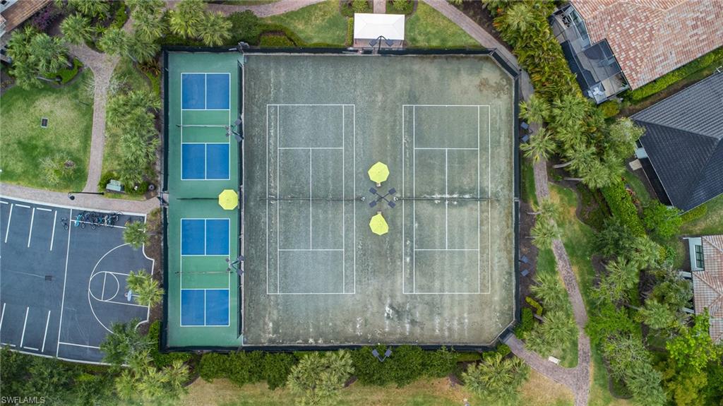 9231 Shadow Oak Lane Naples, FL 34120 - Photo 44 of 46 a house view with a garden space