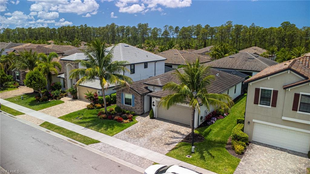 9231 Shadow Oak Lane Naples, FL 34120 - Photo 7 of 46 an aerial view of multiple house