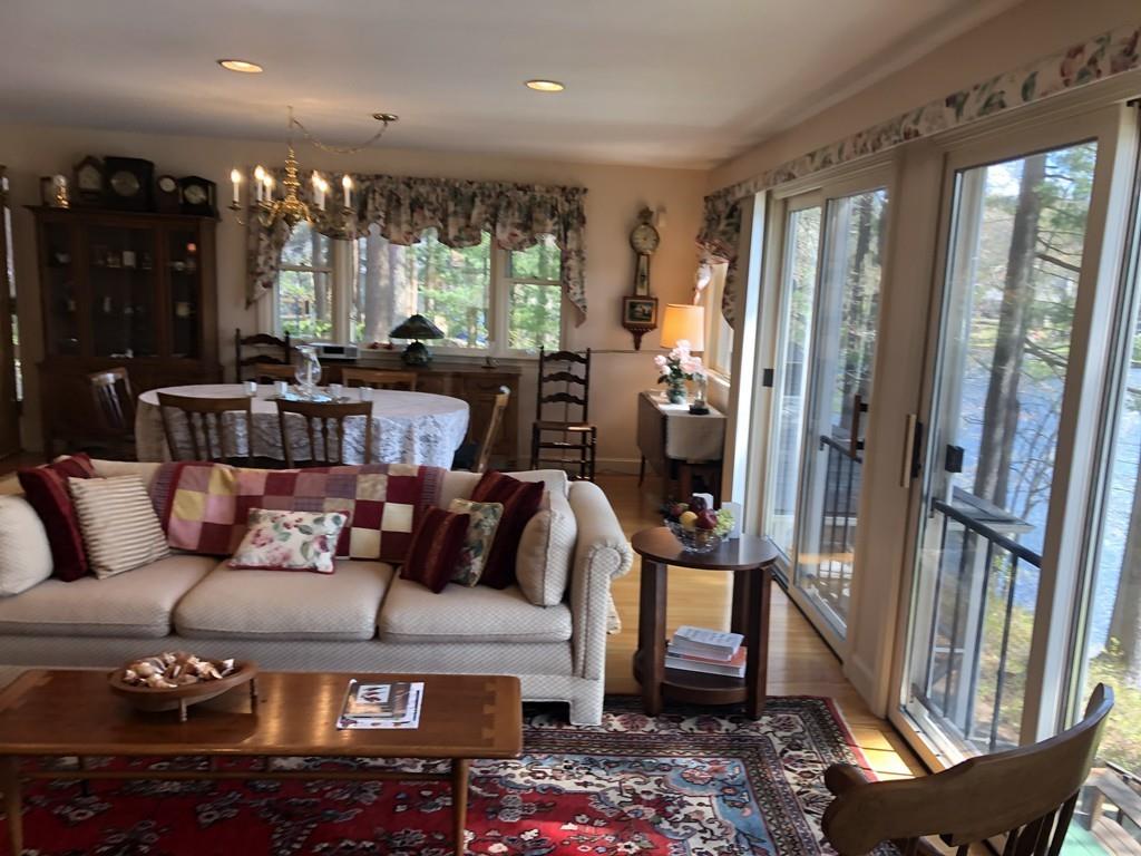 6 Davis Road Stow, MA 01775 - Photo 8 of 28 a living room with furniture and a large window