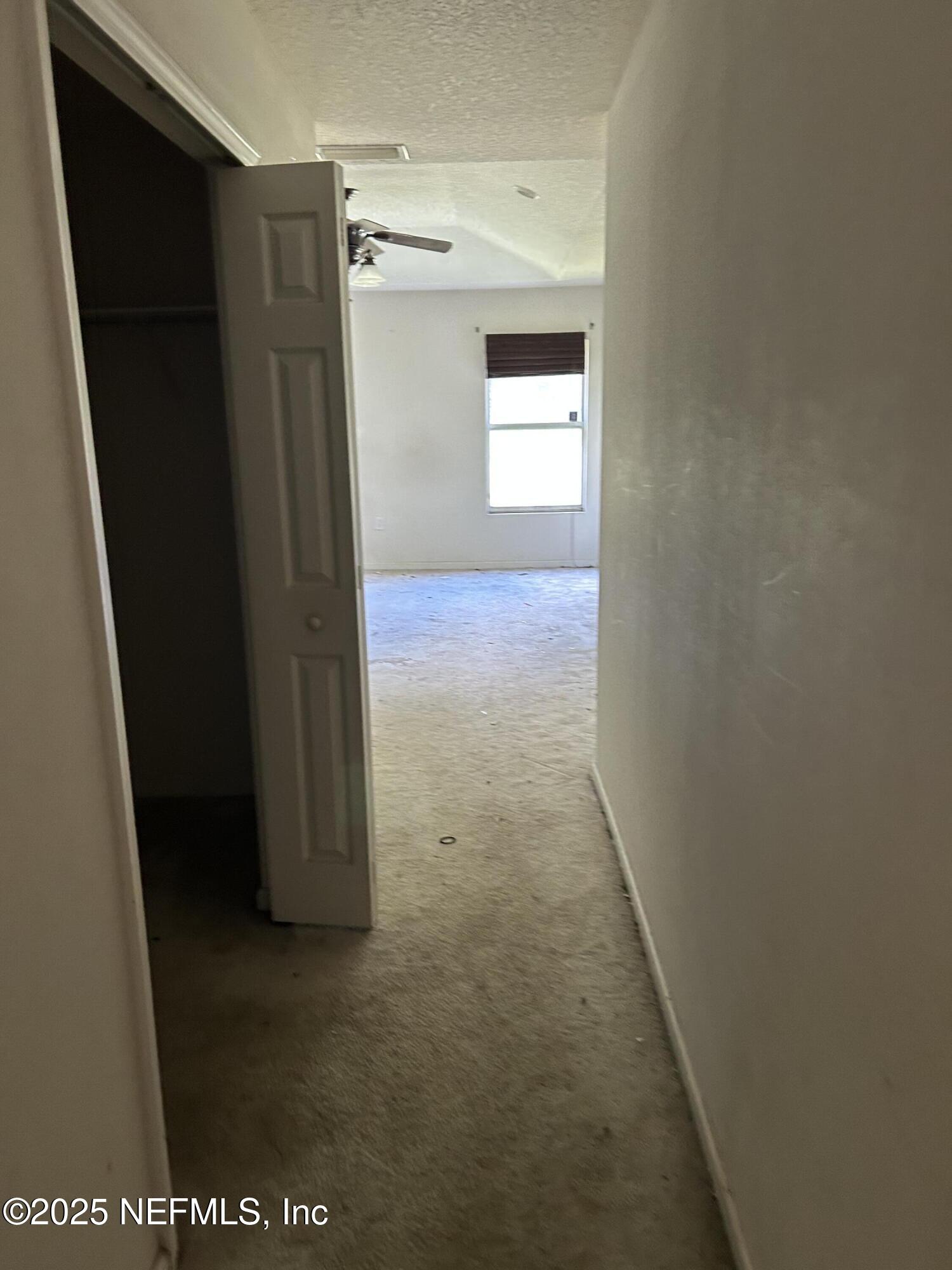 6369 Spring Hollow Court Jacksonville, FL 32218 - Photo 13 of 20 a view of hallway with shower