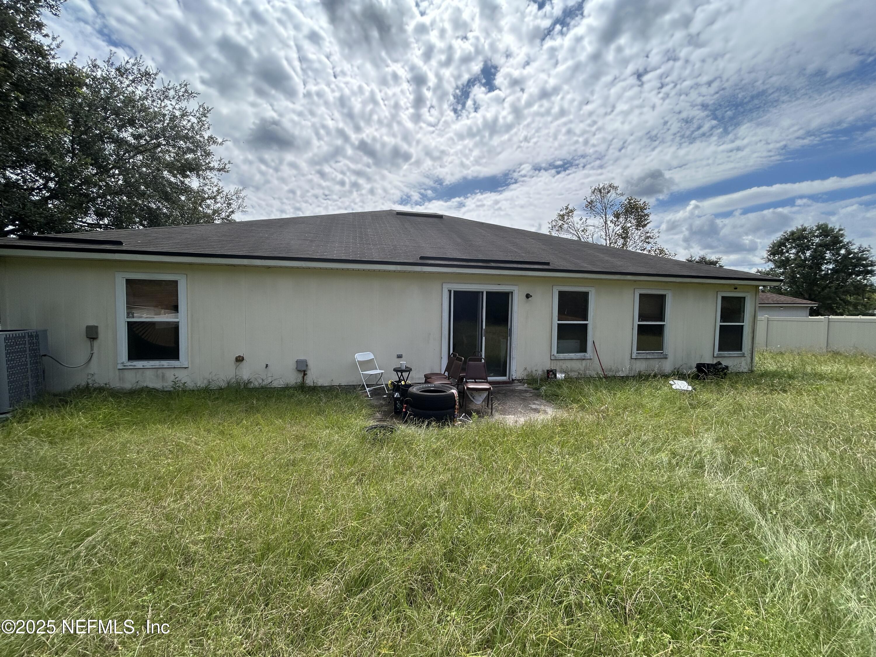 6369 Spring Hollow Court Jacksonville, FL 32218 - Photo 20 of 20 a view of a house with backyard and porch