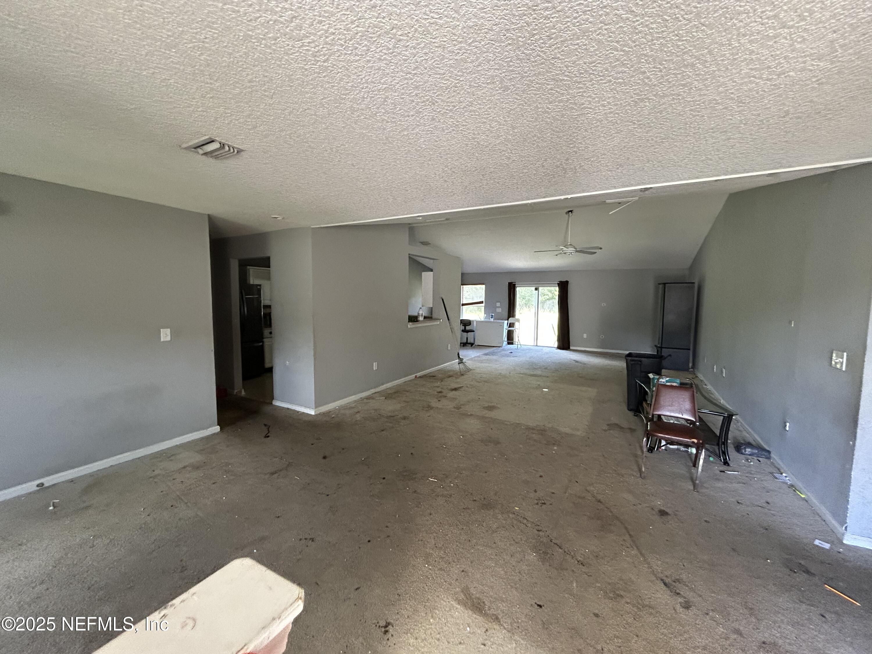 6369 Spring Hollow Court Jacksonville, FL 32218 - Photo 3 of 20 a view of a livingroom with furniture and a couch