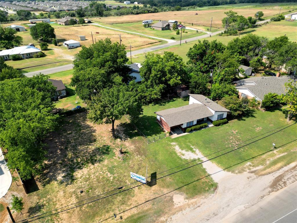 321 West Highway 199 Springtown, TX 76082 - Photo 20 of 22 an aerial view of residential houses with outdoor space