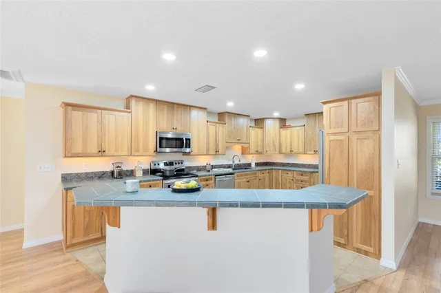 $574,900 | 7838 Sloewood Drive, Mount Dora, FL 32757