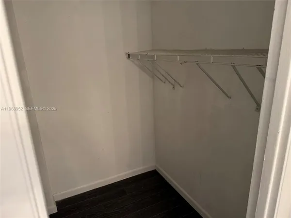a view of small space with racks on the wall
